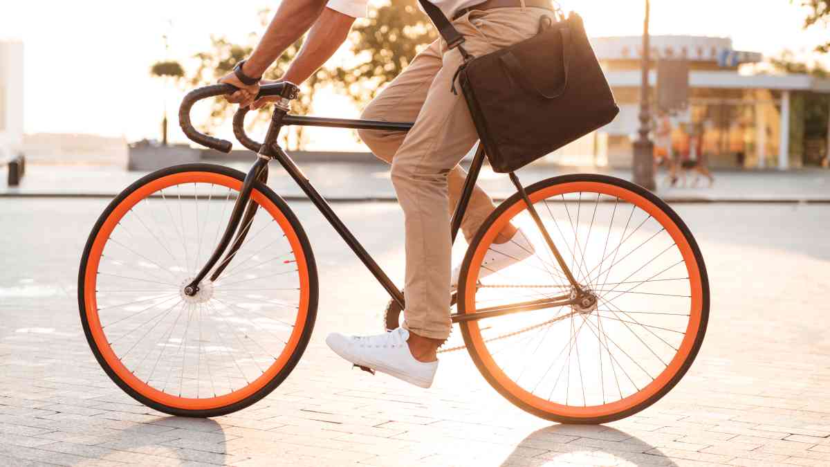 handsome young african man early morning with bicycle