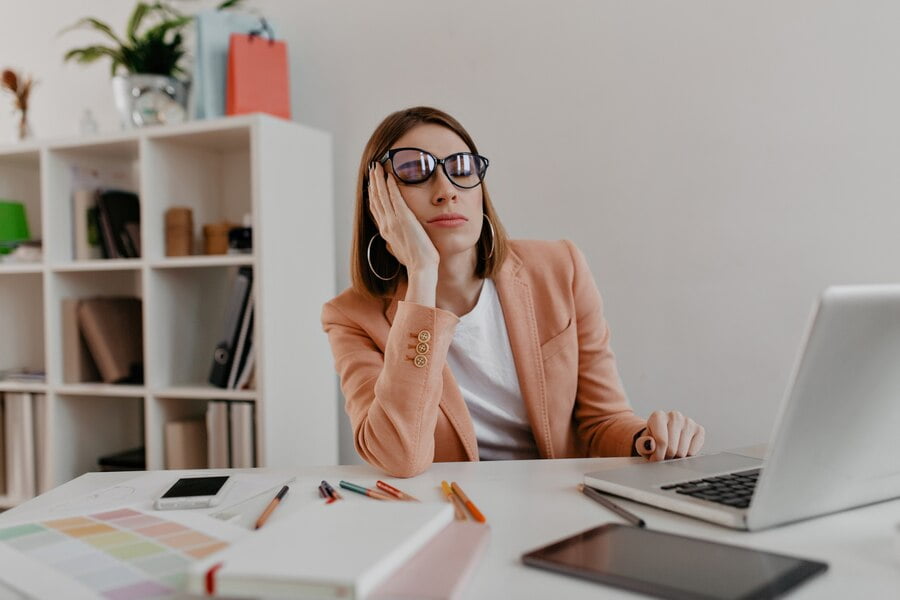 tired worker wearing glasses falling asleep workplace snapportrait lady jacket white office 197531 10702