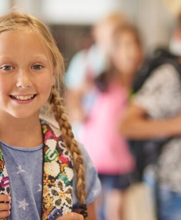 cheerful-girl-break-school_329181-14266