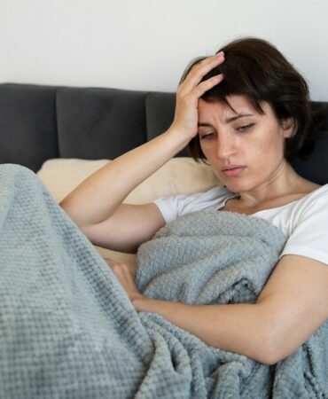 sick-woman-home-medium-shot_23-2149149745