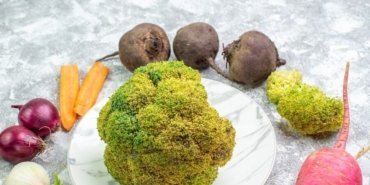 front-view-fresh-cauliflower-with-beet-radish-garlic-onions-white-desk-ripe-salad-meal-color-photo-food_140725-103242