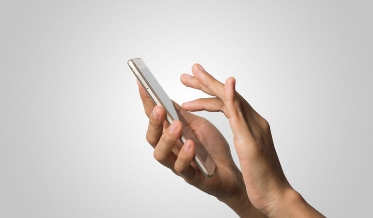 woman-hand-holding-smart-phone-blank-screen-copy-space-hand-holding-smartphone-isolated-white-background_1150-2241