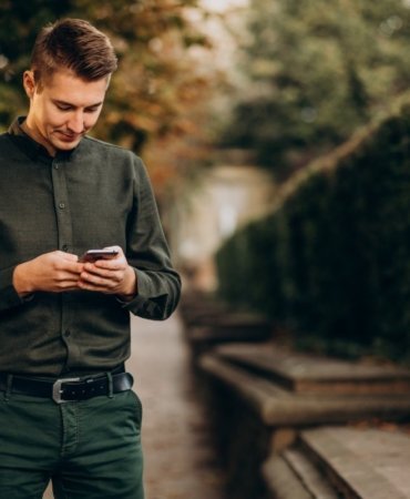 young-man-adult-student-talking-phone